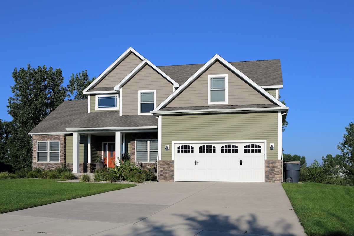 Modern style suburban home view from the street composite siding